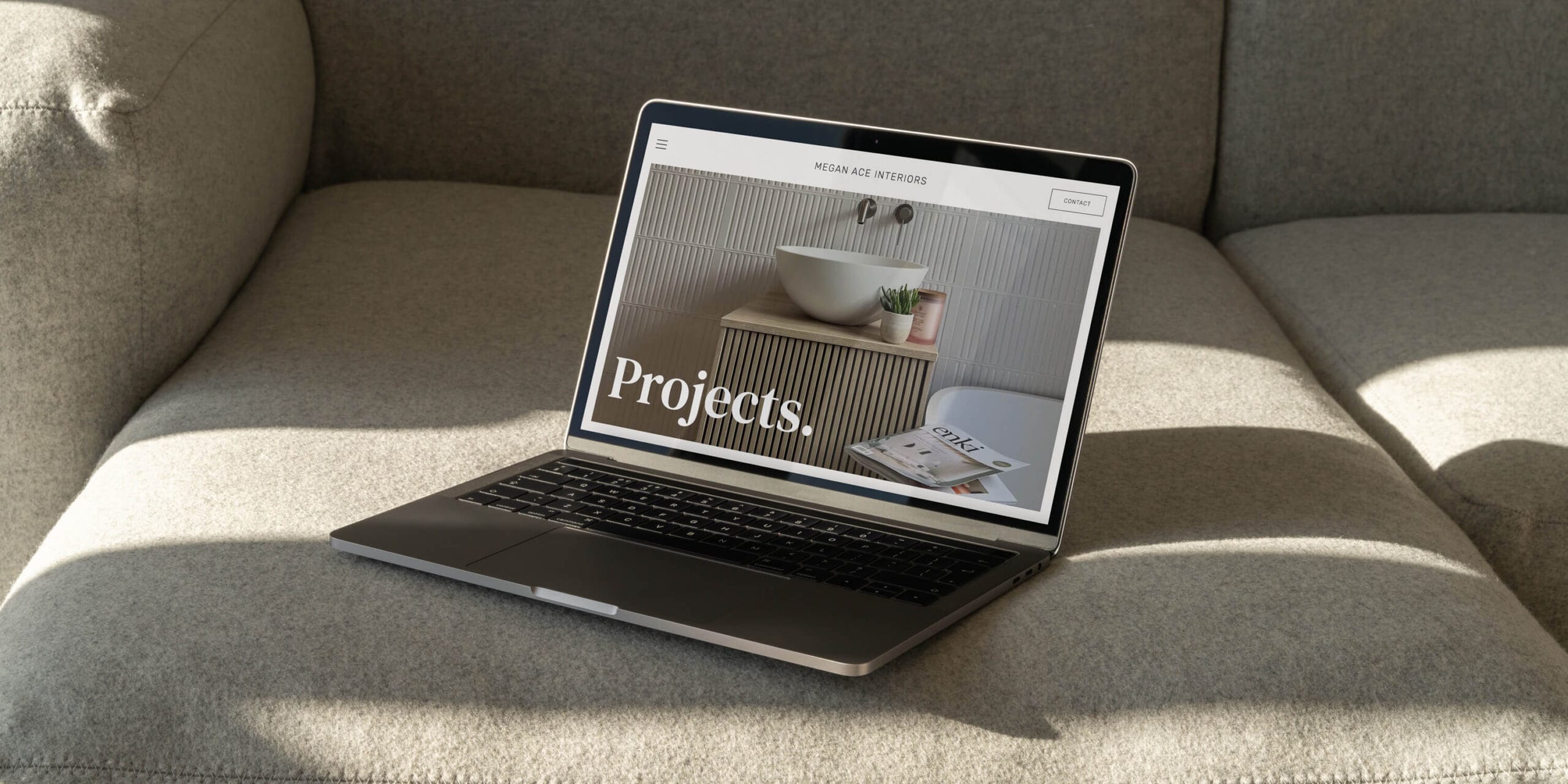 Megan Ace Interiors website displayed on a MacBook, designed by Larch — website design for an interior designer in Worcester